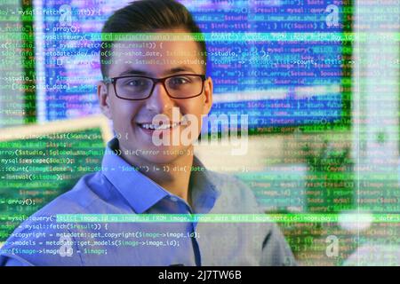 Double exposure of handsome male programmer in office and computer code Stock Photo