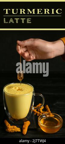 Woman pouring healthy turmeric drink from jug into glass on light ...