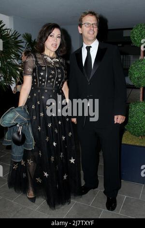 LOS ANGELES - SEP 12:  Phil Laak, Jennifer Tilly at the Mercy For Animals 15th Anniversary Gala  at London Hotel on September 12, 2014 in West Hollywood, CA Stock Photo