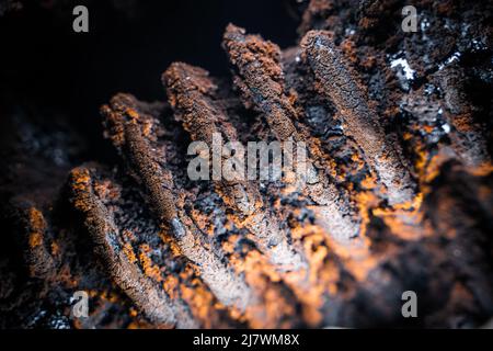 Tar and soot on the pipes of a solid fuel boiler close-up Stock Photo