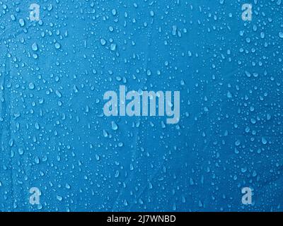 Water drops on waterproof membrane fabric. Morning dew on tent. Stock Photo
