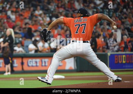 May 6 2022: Houston pitcher Luis Garcia (77) throws to first during the ...