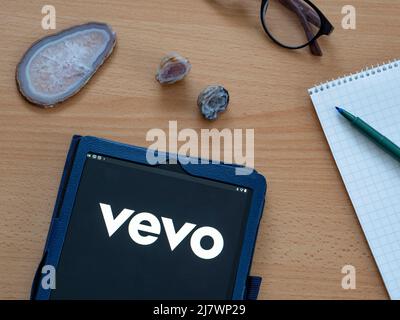 In this photo illustration Vevo LLC owned by Alphabet Inc. logo seen displayed on a tablet Stock Photo