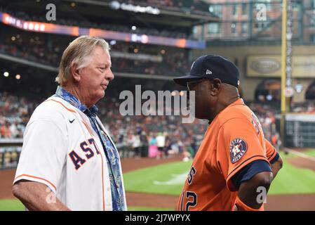 Former Houston Colt .45s/Astros Pitcher Larry Dierker talks with Houston Astros manager Dusty Baker Jr. (12) before the MLB game between the Houston A Stock Photo