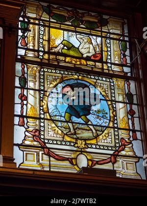 Stained glass window by Edward Burne Jones in the Poynter Room ( now the Cafe), Victoria and Albert Museum, South Kensington, London, UK Stock Photo