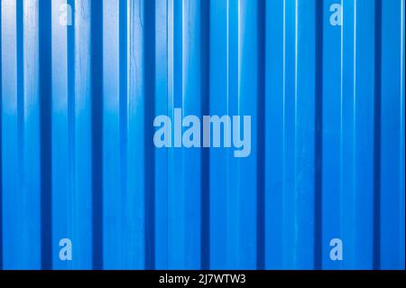 Blue container wall with corrugated metal as background with text free space Stock Photo