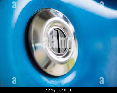 Close-up view of the key hole on a blue car Stock Photo