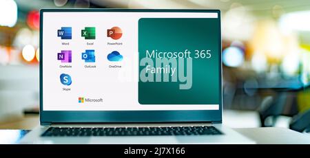 POZNAN, POL - DEC 26, 2021: Laptop computer displaying logos of Microsoft 365 Family, a family of client software, server software, and services devel Stock Photo