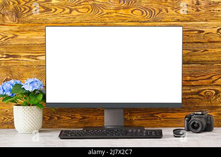 Mockup Copy Space Blank Screen Concept. Stylish workspace with computer on home or studio Stock Photo