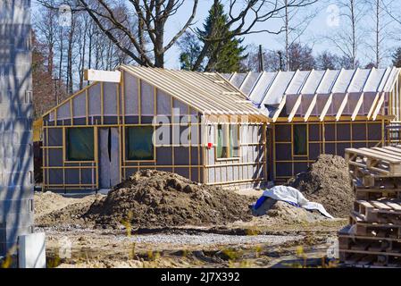 Single Family Home Construction. Interior frame of new wooden house under construction. Stock Photo