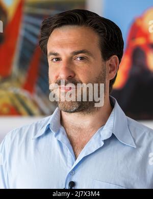 Munich, Germany. 11th May, 2022. Argentine activist Esteban Servat participates in a press conference of the grassroots movement 'Debt for Climate!' on the upcoming G7 protests of the International Climate Movement. Credit: Peter Kneffel/dpa/Alamy Live News Stock Photo
