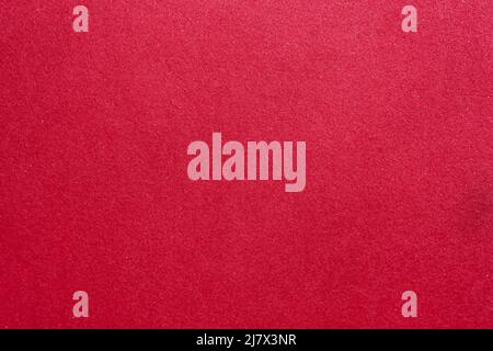 abstract red background or christmas paper with fine glitter. High quality photo Stock Photo