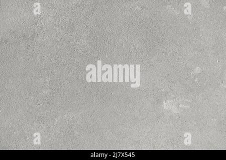 Cement concrete wall background. Gray stone texture and untreated wall surface before finishing. High quality photo Stock Photo