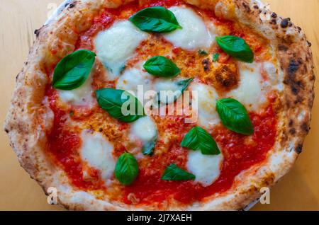 Close up of a Pizza Margherita with tomato sauce, buffalo mozzarella, and fresh basil -- the colors of the Italian flag Stock Photo