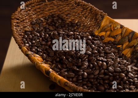 a basket full of freshly roasted coffee beans Stock Photo
