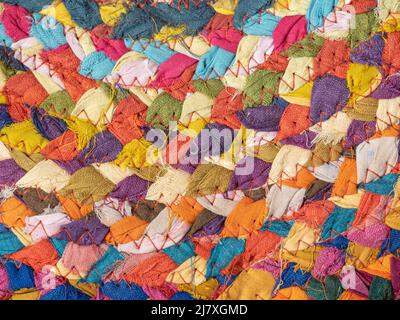 image of braided multi colored woollen yarns Stock Photo