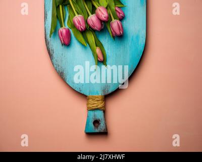 Tulips over a pink background Stock Photo
