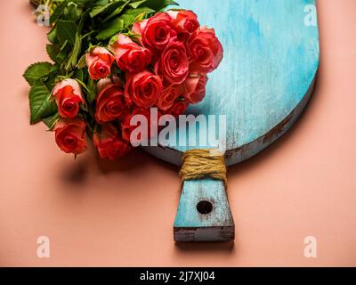 Roses over a pink background Stock Photo