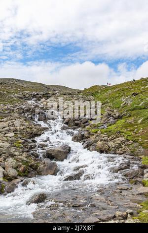 Waterfall at a mountainside in high country Stock Photo