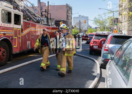 One person died and eight others were hurt, including three firefighters after a fire broke out in a home in the Fordham section of the Bronx, NY May 10, 2022. The four alarm fire tore through a two story home on 2194 Valentine Avenue, FDNY Acting Chief of Fire Operations Richard Blatus said that one person was found inside the home and pronounced deceased on the scene. (Photo by Steve Sanchez/SipaUSA). Stock Photo