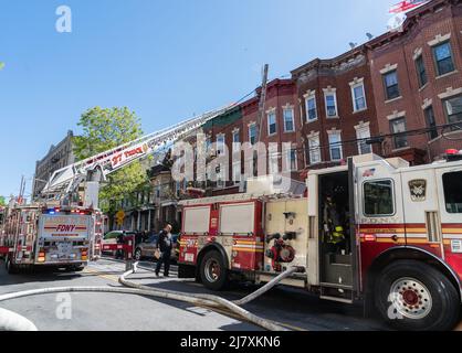 One person died and eight others were hurt, including three firefighters after a fire broke out in a home in the Fordham section of the Bronx, NY May 10, 2022. The four alarm fire tore through a two story home on 2194 Valentine Avenue, FDNY Acting Chief of Fire Operations Richard Blatus said that one person was found inside the home and pronounced deceased on the scene. (Photo by Steve Sanchez/SipaUSA). Stock Photo