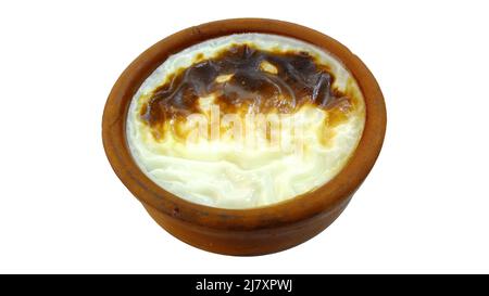 Turkish Dessert Sutlac (Fırın Sütlaç) on an isolated white background, Oven Baked Rice Pudding in a clay pot, Close up of Traditional Turkish Dessert Stock Photo