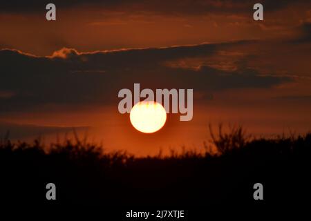 Sunset over Port Issac Cornwall England uk Stock Photo
