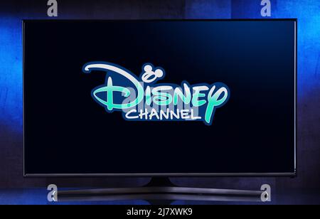 POZNAN, POL - MAR 25, 2022: Flat-screen TV set displaying logo of Disney Channel, an American pay television channel that serves as the flagship prope Stock Photo
