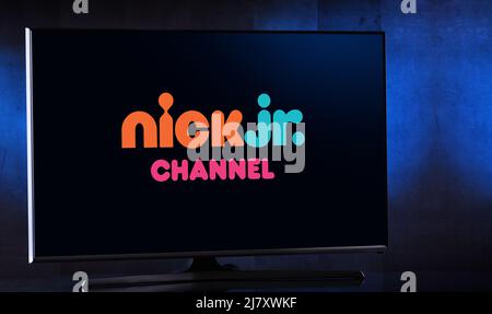 POZNAN, POL - MAR 25, 2022: Flat-screen TV set displaying logo of Nick Jr., an American pay television channel Stock Photo