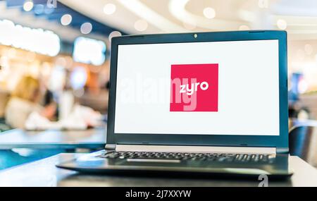 POZNAN, POL - FEB 25, 2022: Laptop computer displaying logo of Zyro, a software company, providing website building, eCommerce, and artificial intelli Stock Photo