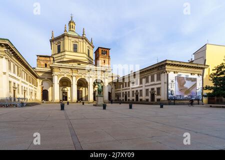 Milan, Italy - March 02, 2022: View of the Basilica San Lorenzo Maggiore, with locals and visitors, in Milan, Lombardy, Northern Italy Stock Photo