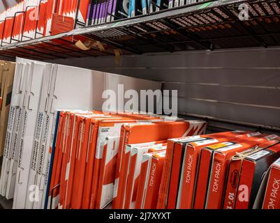 Lynnwood, WA USA - circa May 2022: Angled view of drumheads for sale inside a Guitar Center musical instrument store. Stock Photo