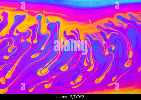 Psychedelic multicolored background abstract. Rainbow colors. patterns background. Photo macro shot of soap bubbles Stock Photo