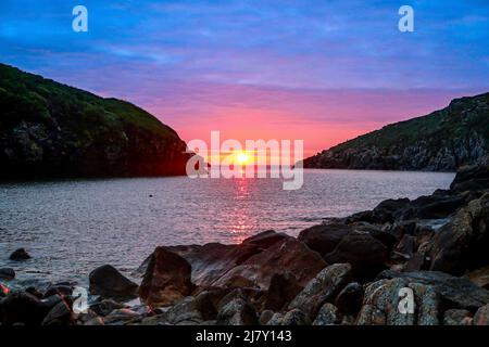 Sunset at Port Quin beach on the North Cornwall Coast. Stock Photo