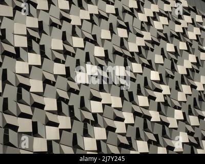 kaleidoscopic details of angular 3D cladding on modern high-rise city ...
