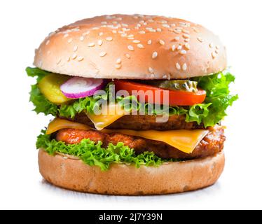 Hamburger with cheese and fresh vegetables isolated on white. Stock Photo