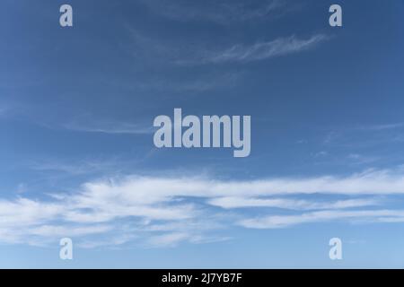 Gentle white clouds on blue sky - high quality without noise. Stock Photo