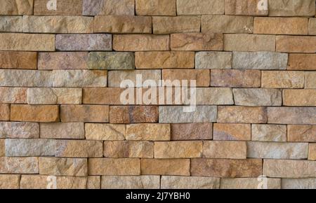 Full frame image of the old beige brick wall. For background, poster, loft style, texture, plenty place for text. Stock Photo