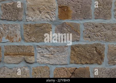 Full frame image of the old beige brick wall. For background, poster, loft style, texture, plenty place for text. Stock Photo