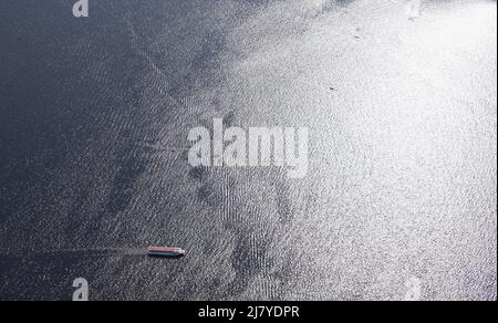 Hamburg, Germany. 11th May, 2022. An Alster steamer sails on the Outer Alster. Credit: Marcus Brandt/dpa/Alamy Live News Stock Photo