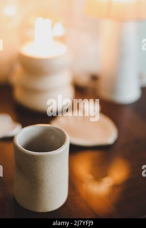ceramic cup on a cozy warm background indoors.  Stock Photo