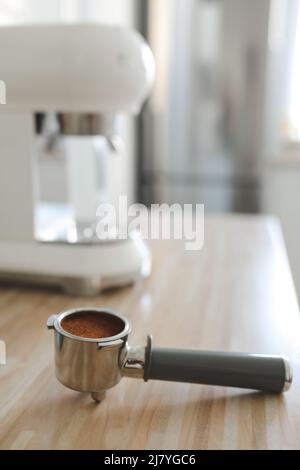 white stylish coffee machine in cozy kitchen interior Stock Photo