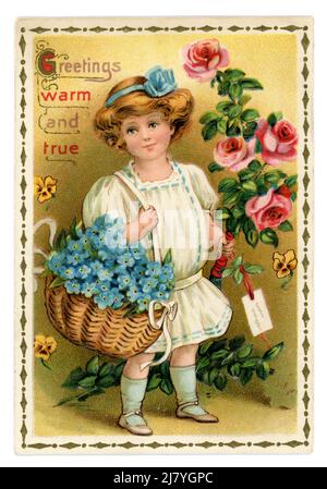 Original Edwardian sentimental greetings card, young girl holding a bunch of roses and basket of forget me not flowers, circa 1909, U.K. Stock Photo