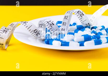 Weight loss pills. Obesity treatment. Overweight problems