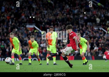 Manchester United's Alejandro Garnacho scores their side's second goal of the game from the penalty spot during the FA Youth Cup final match at Old Trafford, Manchester. Picture date: Wednesday May 11, 2022. Stock Photo