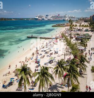 Aerial view of tourists on Junkanoo Beach with cruise ships in distance, Nassau, Bahamas Stock Photo