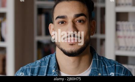 Close-up young happy hispanic male model posing indoors portrait smiling successful businessman manager start-up entrepreneur handsome guy client with Stock Photo