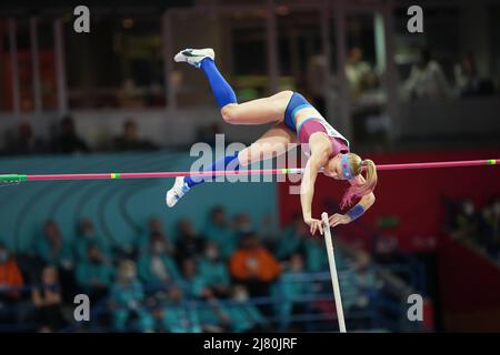 Sandi Morris jumping at the 2022 Belgrade Indoor World Championships in the pole vault specialty. Stock Photo