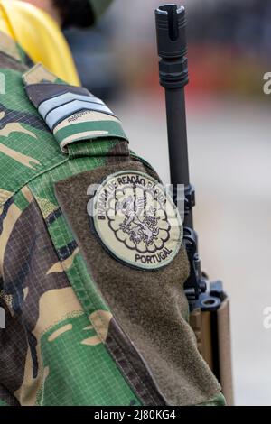 Close up of the shoulder patch of a Brigada de Intervencao Rapida portuguese army soldier using camouflage military uniform Stock Photo
