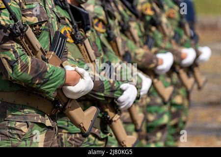 Close up of portuguese army troops using camouflage military uniform Stock Photo